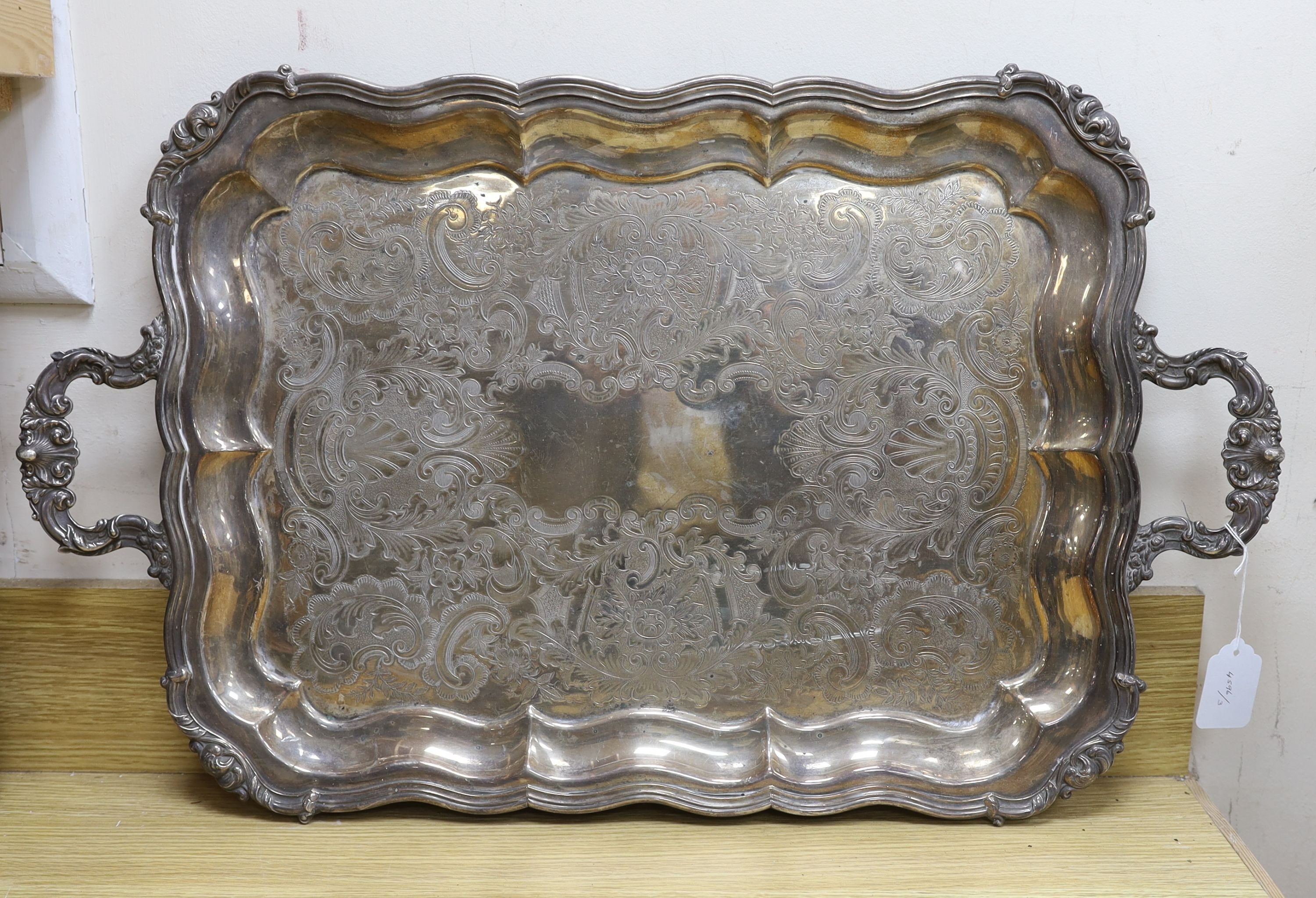 A large plated two-handled tray - 71cm long